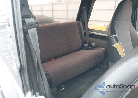 2000 Jeep Wrangler Sport z USA, uszkodzony, nr VIN 1J4FA49S9YP805673